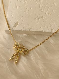 Bag charm Louis Vuitton Gold in Metal - 31528775