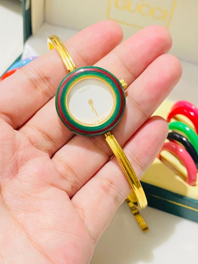Gucci Watch Cherryline Set (Category: Women's Watches) located in Baliuag. Submitted by clicksmileph (Listing ID 1265523230, Image 2). Description: Gucci Bangle watch ( Guaranteed Authentic) 22,000 Php Details: with Serial # at the back Engraved "Gucci" Lock Condition: 9/10 Medium to Large- Best fit for 6-6.5 inches Set with: Gucci Gold Plated Watch 11 Interchangeable bezels / rings Gucci Presentation Box Grab this watch thru LBC Cash on delivery