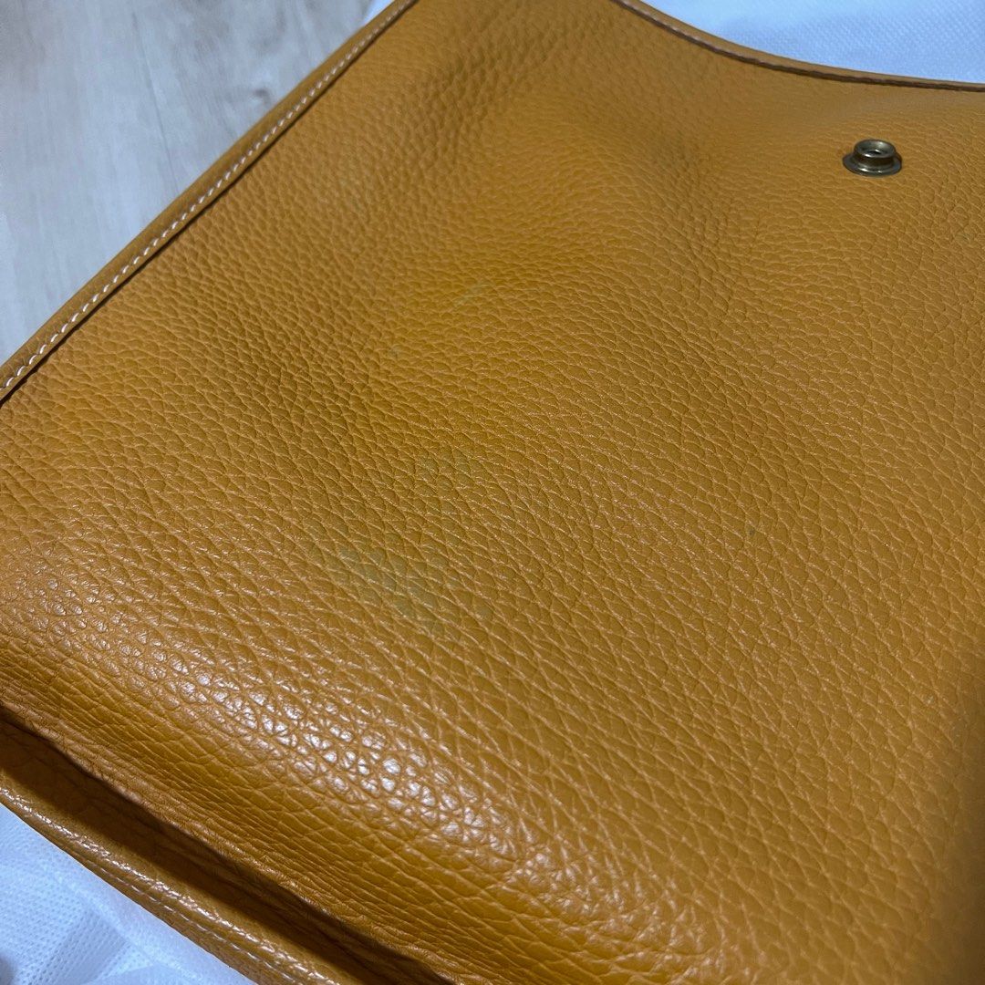 (Fast deal) Hermes Evelyn GM 33 Clemence Leather Mustard Yellow (Category: Bags & Wallets) located in Singapore. Submitted by jang_aixin (Listing ID 1265501680, Image 3). Description: Fast deal $2000. Authentic. Vintage piece, Clemence leather, serial (with date stamp): R Square G Comes with Amazon strap (non adjustable, canvas) and preloved luxury shop in-house dustbag. Have slight storage smell. Feel free to pm if interested. Viewing welcome to