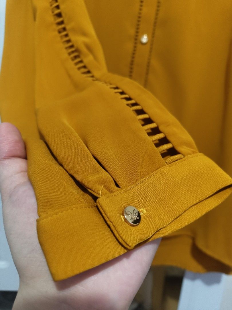 Kamiseta (Category: Blouses) located in Paranaque City. Submitted by declutterqueeeeen (Listing ID 1265530211, Image 3). Description: Medium to Large frame Color: Mustard Never worn.