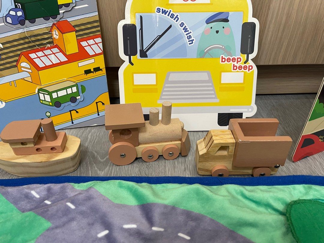 Learning Time educational kit (Category: Educational & Learning Toys) located in Quezon City. Submitted by swiftturtle_0b2e05 (Listing ID 1265363873, Image 2). Description: Wooden transportation ,cloth mat with detachable colors , busy board .