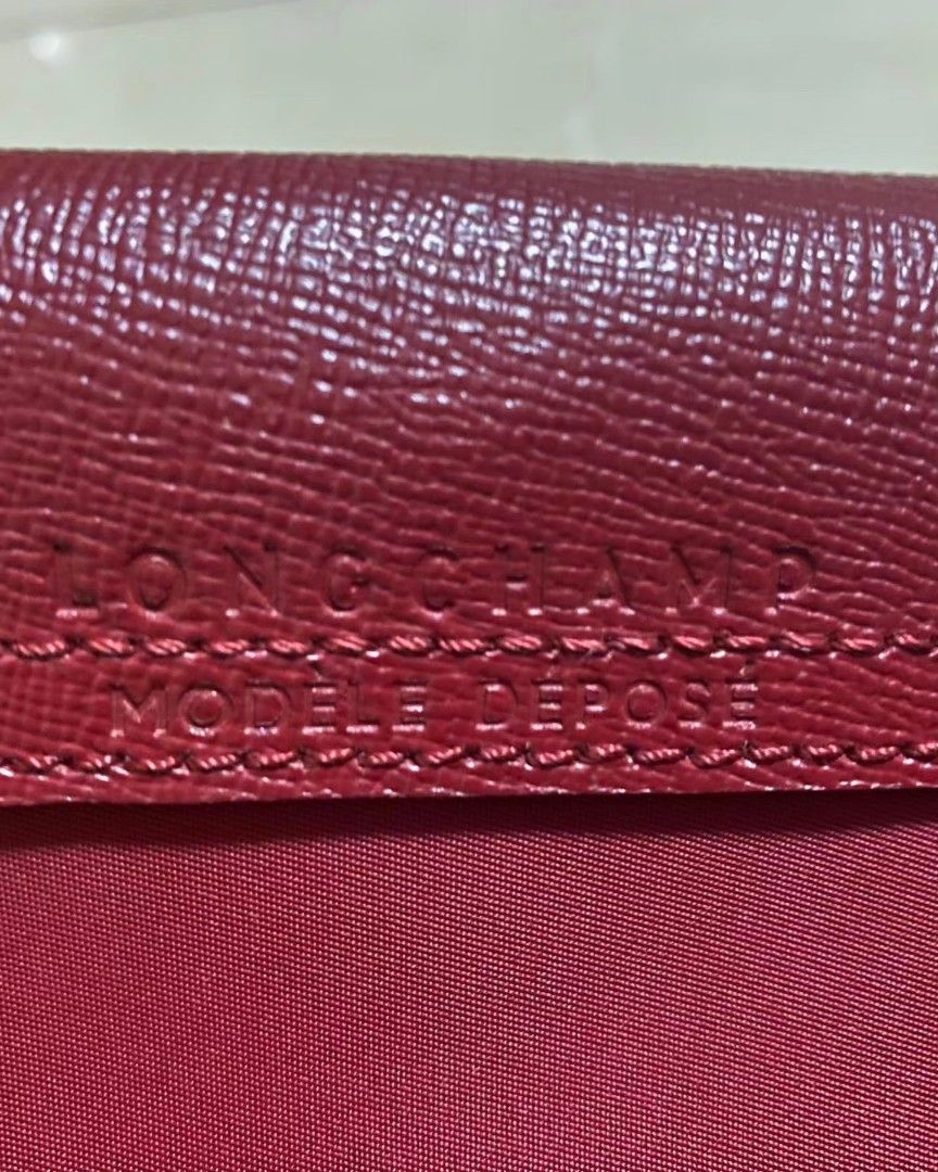 Longchamp Le Pliage Néo Medium Handbag with Strap (Category: Luxury Bags & Wallets) located in Makati City. Submitted by ehkcmasaya (Listing ID 1265528691, Image 2). Description: Another decluttered item FOR SALE!!! LONGCHAMP Le Pliage Néo Medium Handbag with Strap ✅️ Removable, adjustable crossbody strap ✅️ Dual top handle ✅️ Top zip with snap flap closure ✅️ Silvertone hardware ✅️ Polyamide canvas ✅️ Lining: Polyamide ✅️ Imported ✅️ SIZE: 12.6"