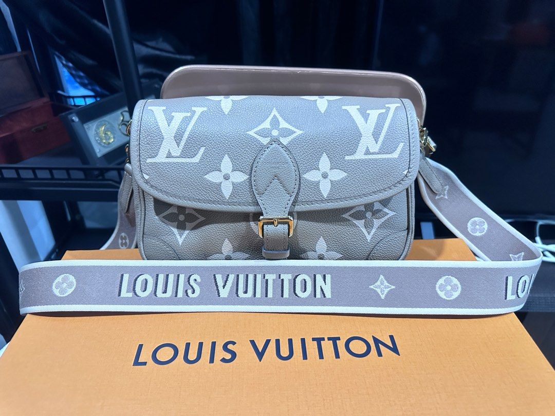 Authentic Louis Vuitton Diane Handbag in Cream Empreinte Leathe