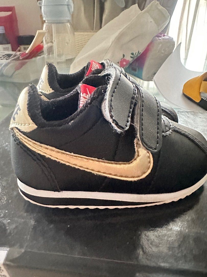 nike cortez black with gold swoosh