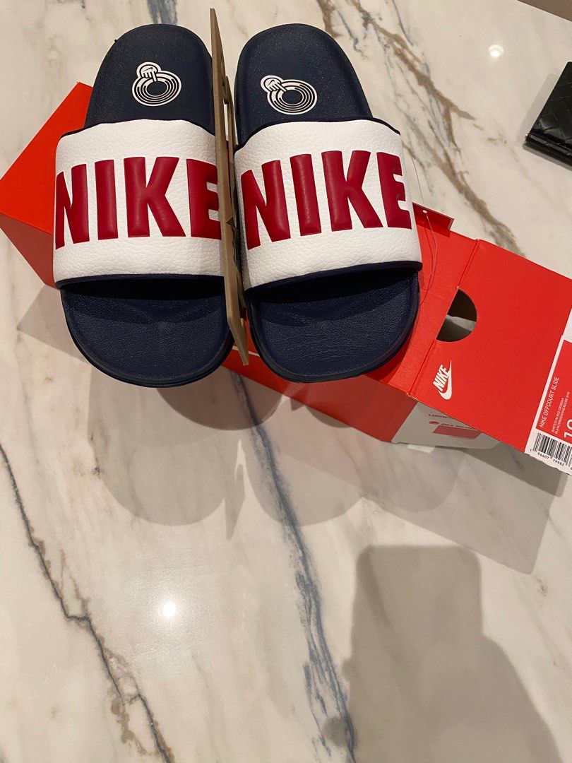 Buy nike slippers discount at 50 off