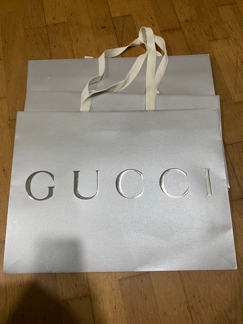 Gucci paper bag white top
