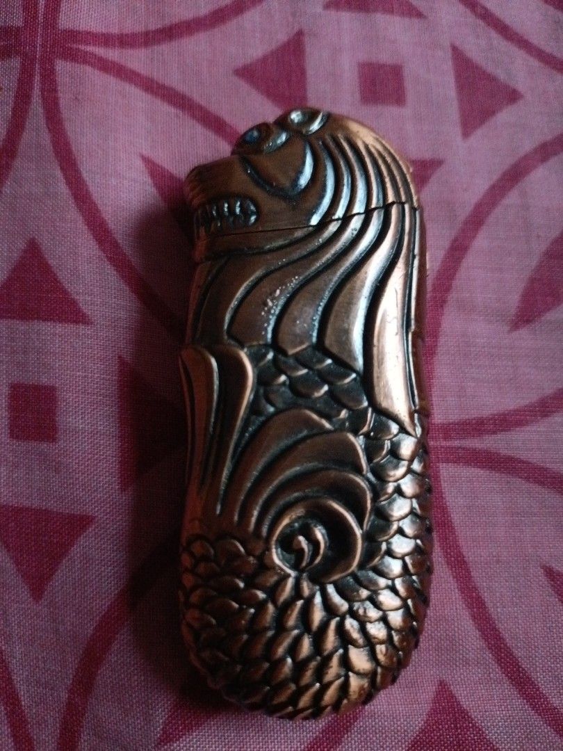 singapore merlion lighter, Furniture & Home Living, Kitchenware &  Tableware, Other Kitchenware & Tableware on Carousell