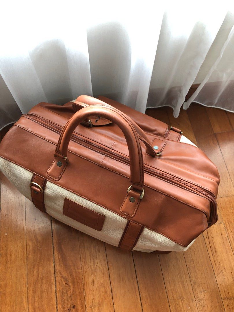 Men's canvas and leather duffle bag store