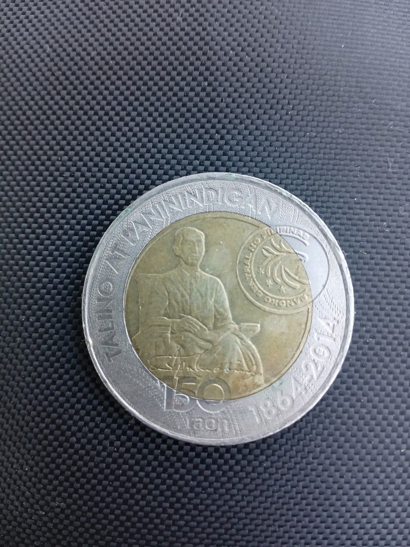 10-piso Apolinario Mabini coin (Category: Currency) located in San Pedro. Submitted by ohyeahph (Listing ID 1265624904, Image 2). Description: 10-piso coin Apolinario Mabini 150th birth anniversary, 1864-2014..