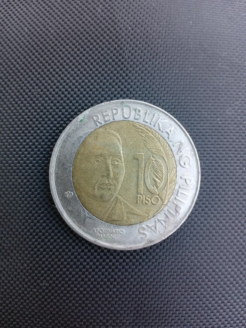10-piso Apolinario Mabini coin (Category: Currency) located in San Pedro. Submitted by ohyeahph (Listing ID 1265624904, Image 1). Description: 10-piso coin Apolinario Mabini 150th birth anniversary, 1864-2014..