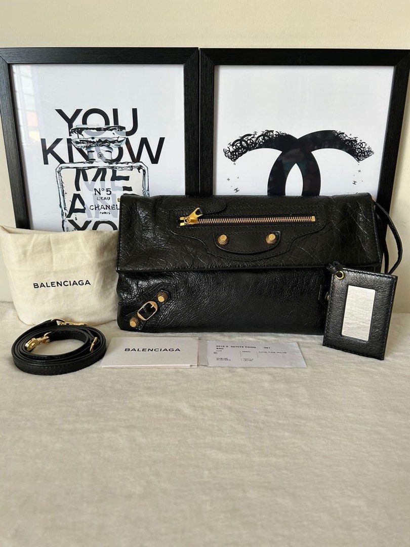 Balenciaga Classic Envelope Clutch w/ Strap (Category: Luxury Bags & Wallets) located in Manila. Submitted by bagislifeshop (Listing ID 1265694593, Image 1). Description: ☑️Available in Pampanga ✅Condition: 9/10 ✅Material: Lambskin leather ✅Colour: Black in GHW ✅Inclusions: Dustbag, cards, mirror and strap .