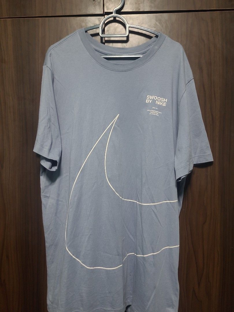 Blue Nike T shirt white swoosh