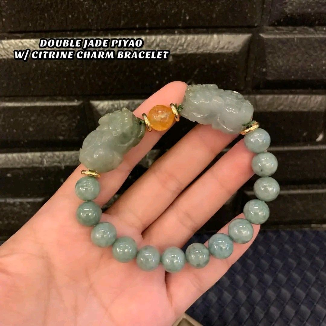 Double jade Piyao with citrine bracelet (Category: Bracelets) located in Manila. Submitted by luckycharmsonlineshopping_ (Listing ID 1265654705, Image 1). Description: 💥 NEW ARRIVAL POST 💞 DOUBLE JADE PIYAO W/ CITRINE CHARM BRACELET 💞 🥀 PI YAO = charm to help you attract great wealth and good Feng Shui in your life. It is also a powerful protector against misfortunes, evil spirits, accidents and most importantly the wrath of the Grand Duke Ju