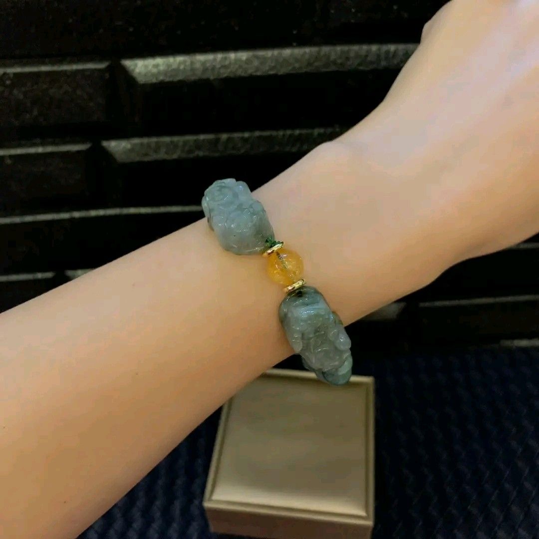 Double jade Piyao with citrine bracelet (Category: Bracelets) located in Manila. Submitted by luckycharmsonlineshopping_ (Listing ID 1265654705, Image 3). Description: 💥 NEW ARRIVAL POST 💞 DOUBLE JADE PIYAO W/ CITRINE CHARM BRACELET 💞 🥀 PI YAO = charm to help you attract great wealth and good Feng Shui in your life. It is also a powerful protector against misfortunes, evil spirits, accidents and most importantly the wrath of the Grand Duke Ju