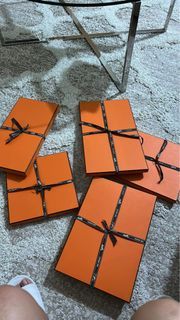 Hermes shawl and scarf boxes with ribbon