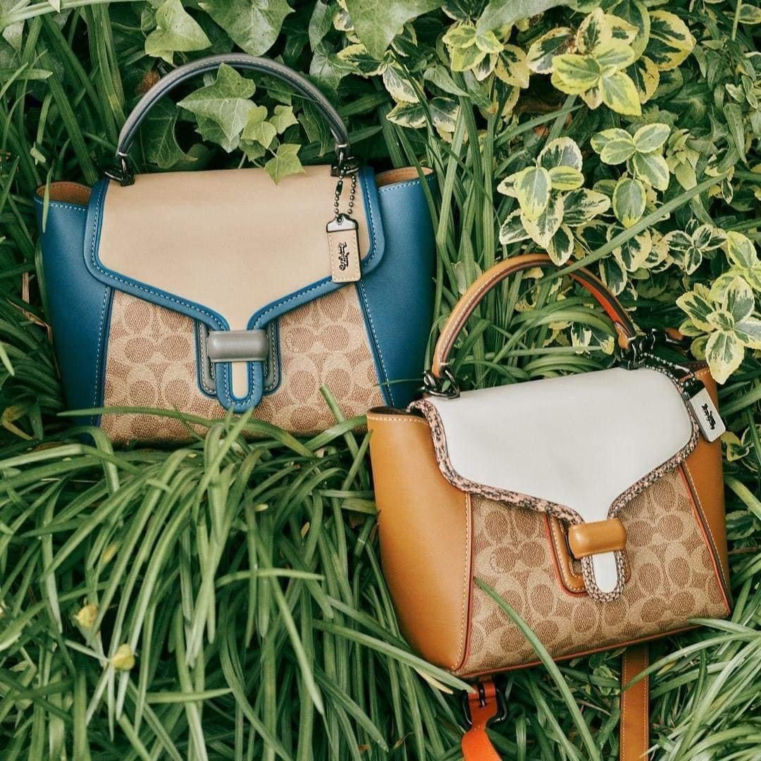 Coach courier carryall with snakeskin hotsell detail
