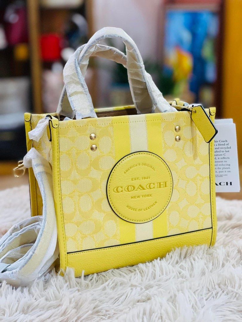 💯ORIGINAL COACH DEMPSEY 22 YELLOW (Category: Luxury Bags & Wallets) located in Quezon City. Submitted by ashongsstore (Listing ID 1265557339, Image 1). Description: Super nice color💛 🐎C0AÇH COLLECTION 🐎 🇵🇭ONHAND🇵🇭 ‼️Please look at our pictures as that is exactly what you are purchasing‼️ 💯GUARANTEED ORIGINAL AND AUTHENTIC or TRIPLE YOUR MONEY BACK! Not REPLICA, OEM, TOP GRADE QUALITY, AUTHENTIC QUALITY or Any other Terms to DENOTE FAKE! 
