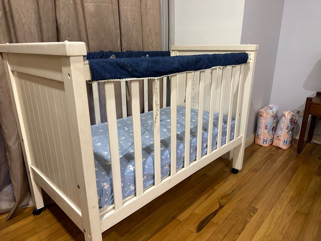 Pre loved Pamco baby cot with mattress