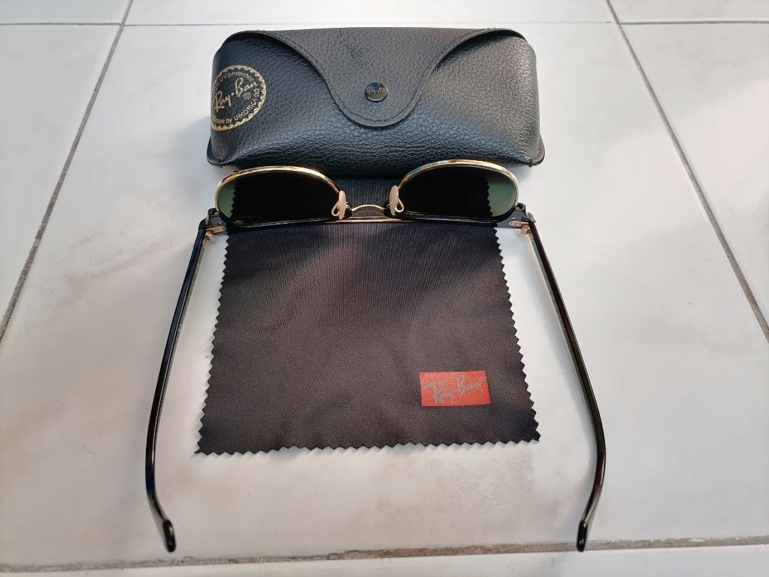 Rayban Clubmaster Polarized (Category: Sunglasses & Eyewear) located in Quezon City. Submitted by jongloyd (Listing ID 1265559990, Image 2). Description: For Sale NEGOTIABLE or SWAPPING/PALIT to RayBan WAYFARER Must be: 1. POLARISED, 2. Color- TORTOISE, 3. Size- 49 to 50 No Issues. Pre Loved. Well Used and kept. Special Features: 1. POLARISED. 2. Size-51. 3. Complete with Original Leather Case and Original Rayban Cleaning Cloth. 4. Color-Shiny Eb