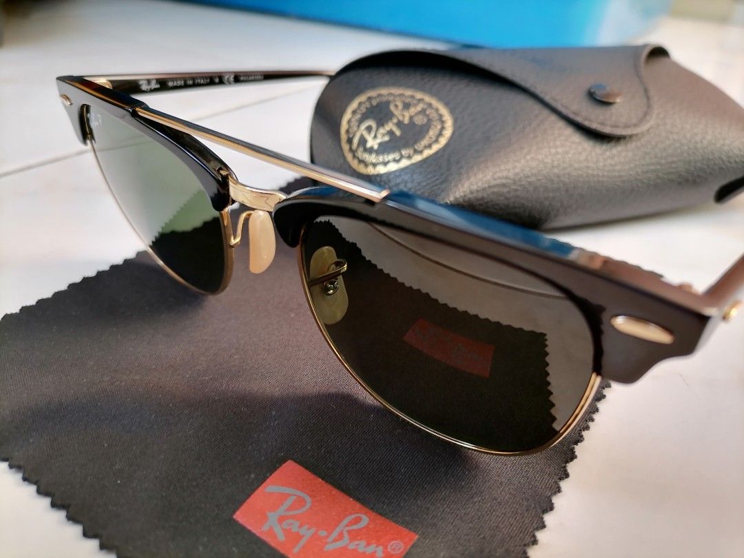 Rayban Clubmaster Polarized (Category: Sunglasses & Eyewear) located in Quezon City. Submitted by jongloyd (Listing ID 1265559990, Image 3). Description: For Sale NEGOTIABLE or SWAPPING/PALIT to RayBan WAYFARER Must be: 1. POLARISED, 2. Color- TORTOISE, 3. Size- 49 to 50 No Issues. Pre Loved. Well Used and kept. Special Features: 1. POLARISED. 2. Size-51. 3. Complete with Original Leather Case and Original Rayban Cleaning Cloth. 4. Color-Shiny Eb