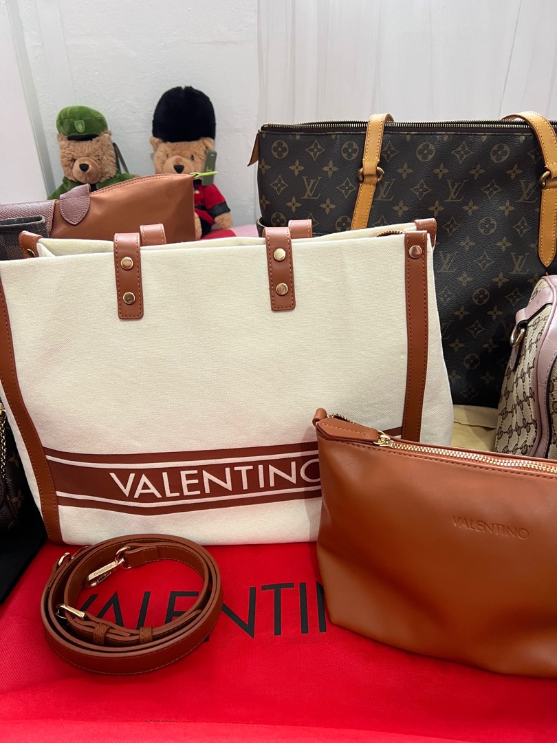 Mario valentino o outlet valentino garavani