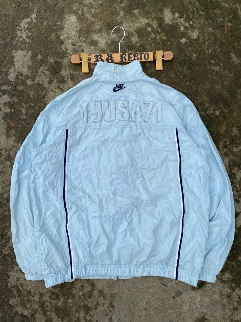 Light blue nike discount windbreaker