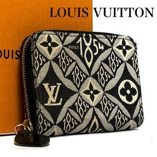 Sold at Auction: (2 Pc) Vintage Louis Vuitton Keychain & Bifold Wallet Set