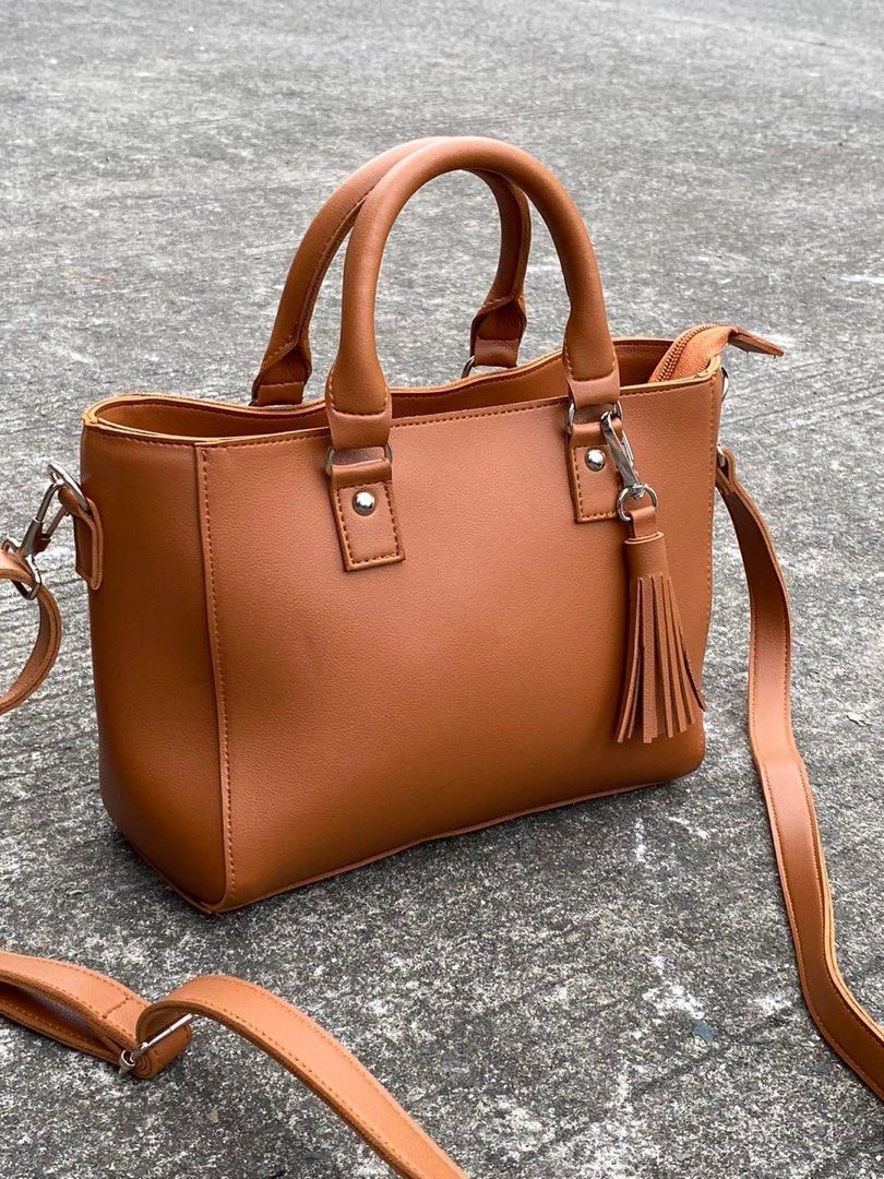 Marikina bags (Category: Cross-body Bags) located in Marikina City. Submitted by ysarabelle (Listing ID 1265905130, Image 3). Description: Marikina made bag Made from high quality synthetic leather Zipper closure with inside and at back pocket Size: L 9 H 7 W 3 .