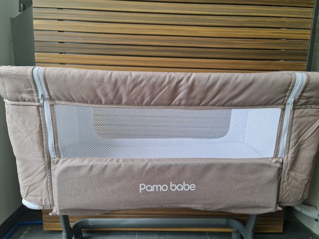 PAMO BABE INFANT BEDSIDE SLEEPER BASSINET FOR NEWBORN (Category: Cots & Cribs) located in Manila. Submitted by miskym (Listing ID 1265897937, Image 2). Description: •Easy to Assemble: This portable bassinet is easy to assemble without any tools. Suitable for newborn babies from birth to 6 months, holds up to 19.8 lbs. •Easy to Move: 4 silent Wheels with brakes that you can move the bassinet from room to room easily. •6 Height Adjustable: 6 height