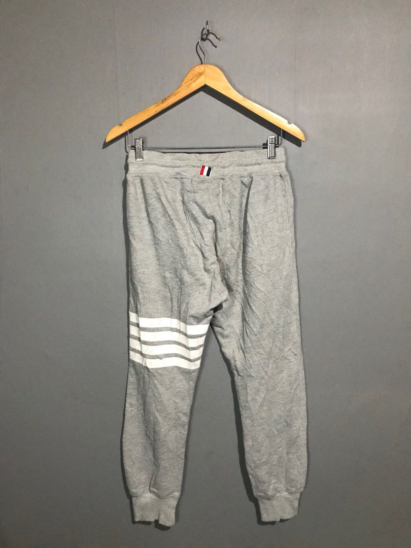 Thom Browne Loopback Knit Engineered 4-Bar Sweatpants (Category: Joggers) located in Santa Cruz. Submitted by hongkongmarketph (Listing ID 1265746432, Image 2). Description: Thom Browne Loopback Knit Engineered 4-Bar Sweatpants In Gray very good condition minimal sign of usage on print see last two photos 28-32 waist length 36.