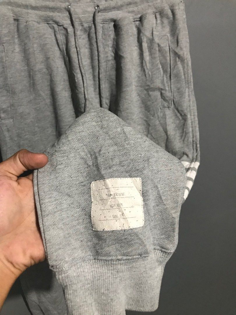 Thom Browne Loopback Knit Engineered 4-Bar Sweatpants (Category: Joggers) located in Santa Cruz. Submitted by hongkongmarketph (Listing ID 1265746432, Image 3). Description: Thom Browne Loopback Knit Engineered 4-Bar Sweatpants In Gray very good condition minimal sign of usage on print see last two photos 28-32 waist length 36.