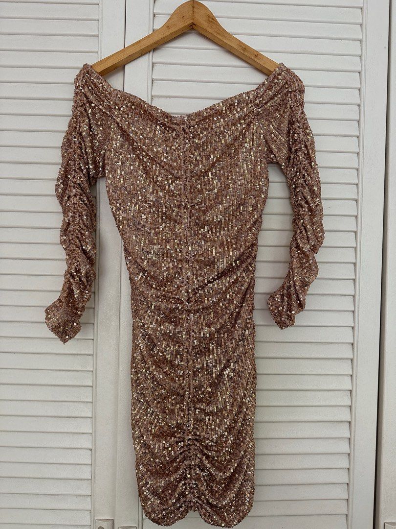 zara gold sequin dress 14 Sparkly Dresses That Will Have You Inundated With Compliments Model height Gold Sequin Midi Dress Zara