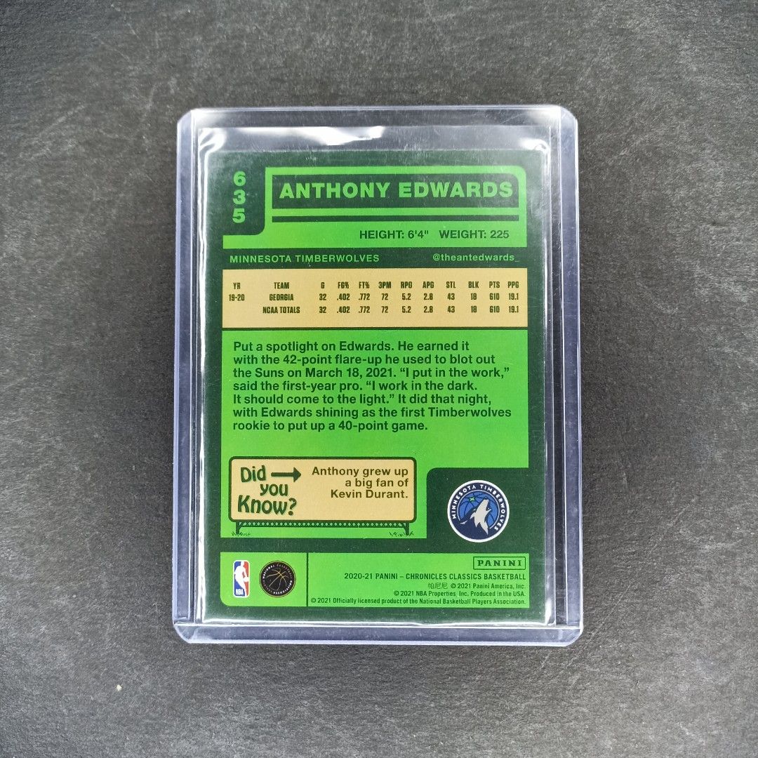2020-21 NBA Card Anthony Edwards Chronicles Classic RC (Category: Raw Singles) located in San Fernando. Submitted by leonsportscollectiblesandtcg (Listing ID 1266026813, Image 2). Description: LEON'S SPORTS COLLECTIBLES Near mint to mint condition. 8-9 unless with stated major issue. Cards are raw. Print lines, minimal white corners and other minor issues do not make your purchase eligible for returns/refunds. Please manage your expectation and d