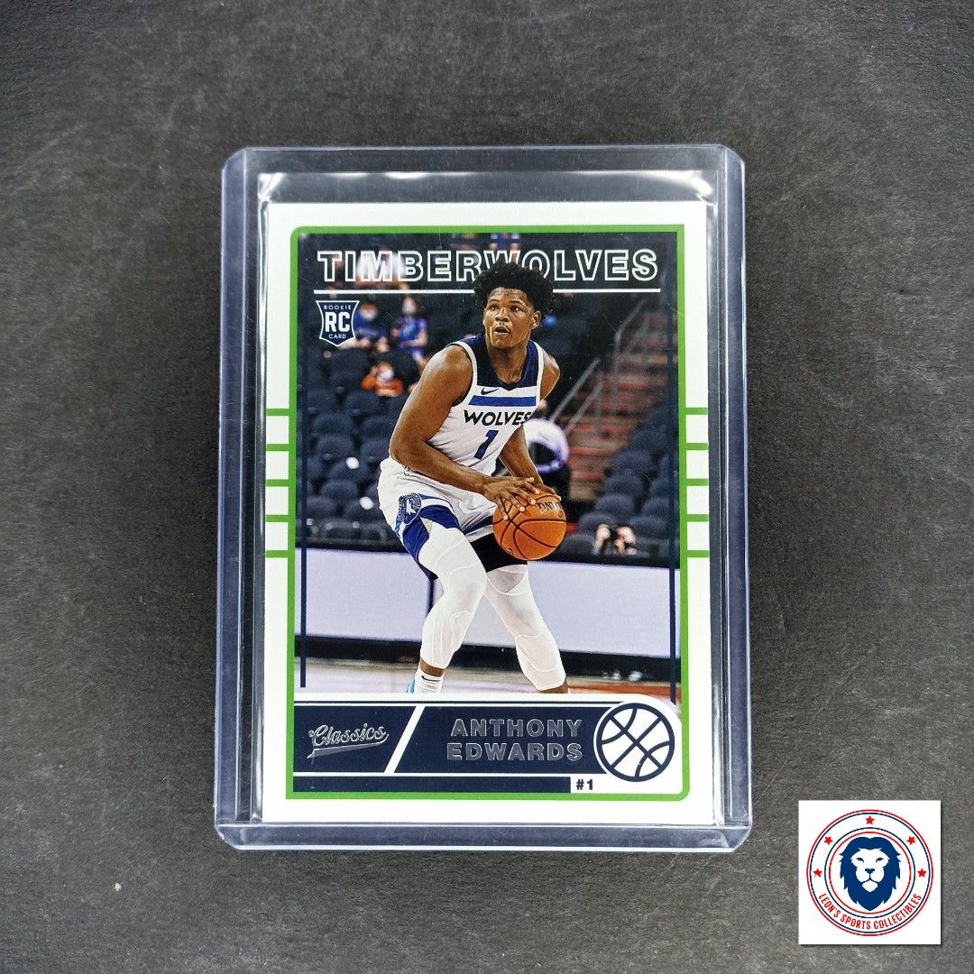 2020-21 NBA Card Anthony Edwards Chronicles Classic RC (Category: Raw Singles) located in San Fernando. Submitted by leonsportscollectiblesandtcg (Listing ID 1266026813, Image 1). Description: LEON'S SPORTS COLLECTIBLES Near mint to mint condition. 8-9 unless with stated major issue. Cards are raw. Print lines, minimal white corners and other minor issues do not make your purchase eligible for returns/refunds. Please manage your expectation and d