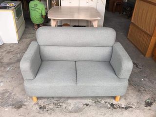 2 seater fabric sofa  50L x 28W x 15 1/2H inches 30 1/2 sandalan height In good condition Code akc 1121