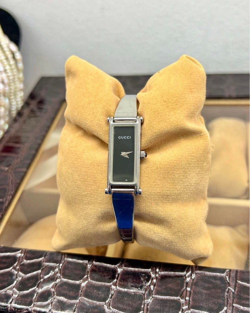 Gucci black dial watch top