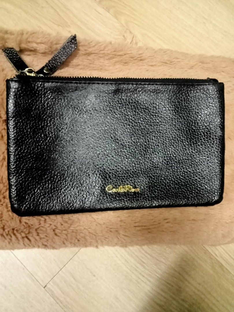 Carlo rino wristlet 2025