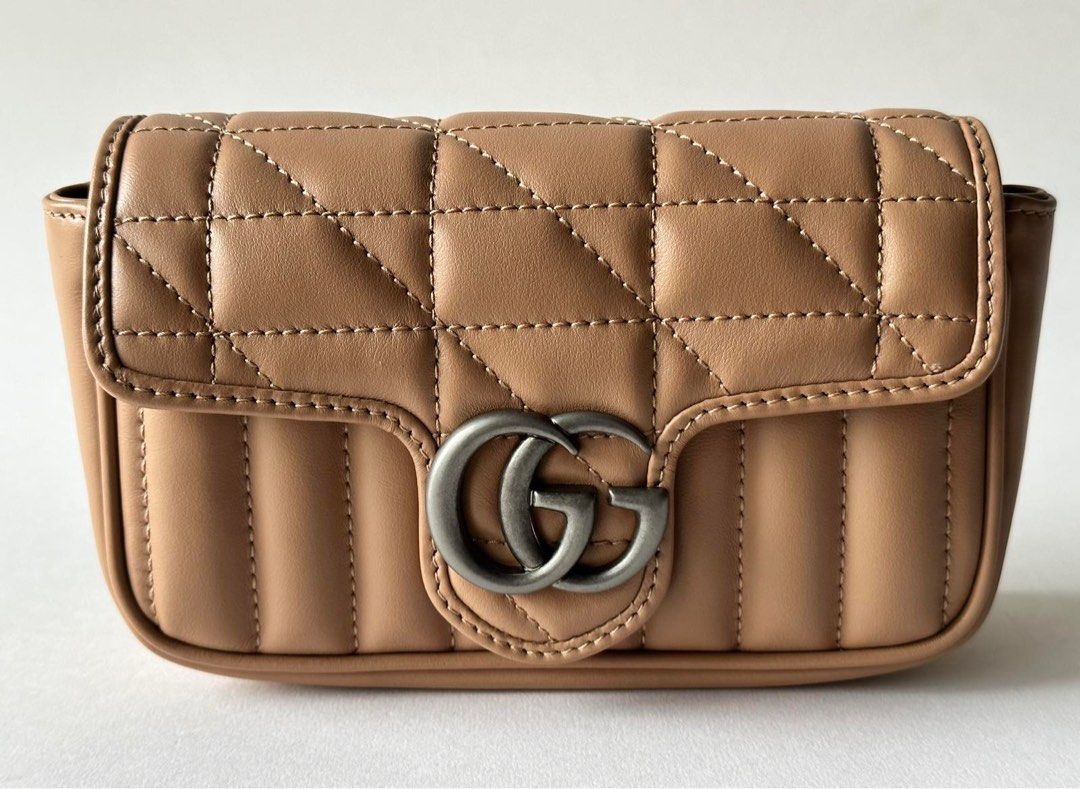 BRANDNEW GUCCI MARMONT SUPER MINI (Category: Luxury Bags & Wallets) located in Taguig. Submitted by sweetluxuryph (Listing ID 1266076543, Image 3). Description: 💯 GUARANTEED AUTHENTIC ✨58,000✨ Store Price Almost 75,000 Rose Beige or Dark Beige Matelassé Leather Mix Diagonal & Vertical Quilted Motif Antique Silver Tone Hardware Iconic Double G Lock Logo Dimensions-6.2”x4”x1.7” Can Fit an iPhone ProMax Detachable Lightweight Chain Detachable Key H