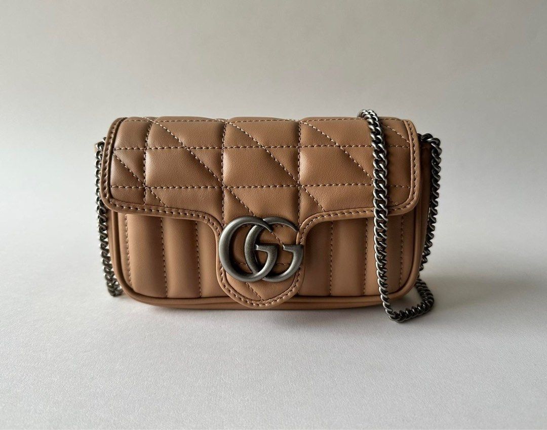 BRANDNEW GUCCI MARMONT SUPER MINI (Category: Luxury Bags & Wallets) located in Taguig. Submitted by sweetluxuryph (Listing ID 1266076543, Image 2). Description: 💯 GUARANTEED AUTHENTIC ✨58,000✨ Store Price Almost 75,000 Rose Beige or Dark Beige Matelassé Leather Mix Diagonal & Vertical Quilted Motif Antique Silver Tone Hardware Iconic Double G Lock Logo Dimensions-6.2”x4”x1.7” Can Fit an iPhone ProMax Detachable Lightweight Chain Detachable Key H