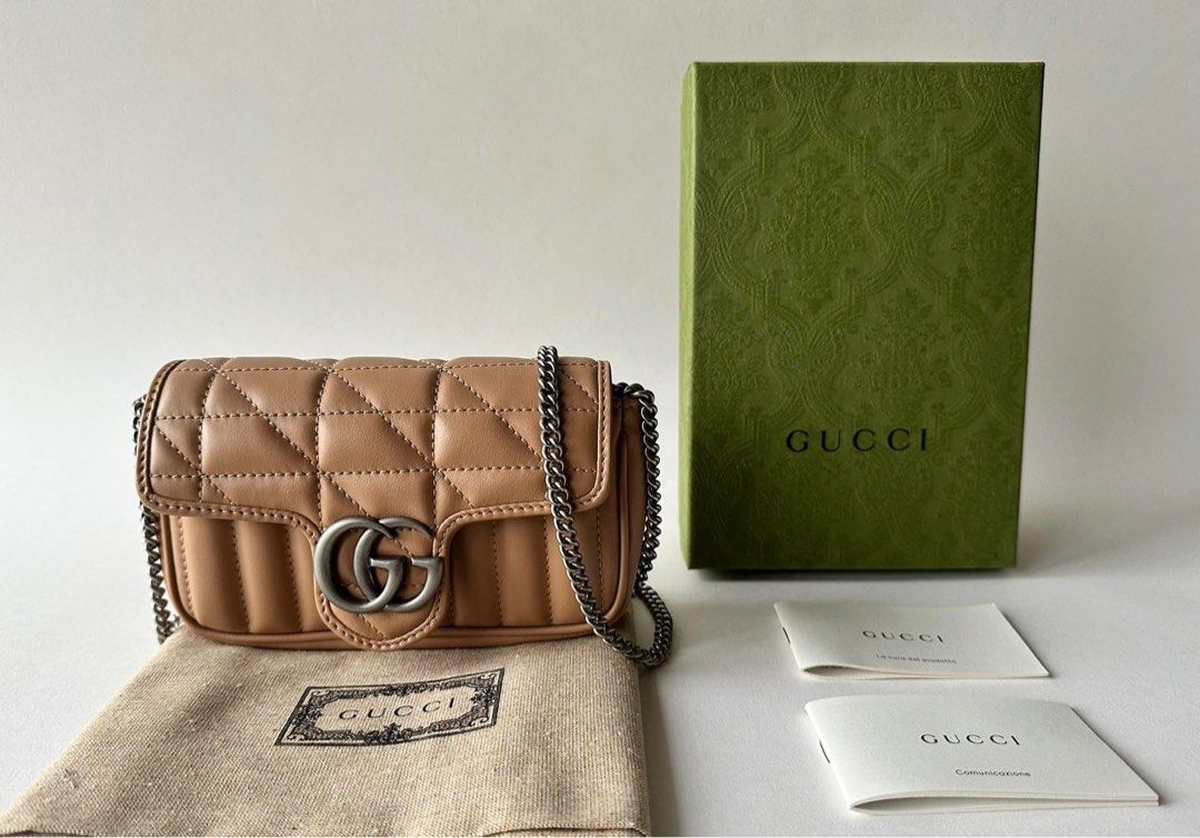 BRANDNEW GUCCI MARMONT SUPER MINI (Category: Luxury Bags & Wallets) located in Taguig. Submitted by sweetluxuryph (Listing ID 1266076543, Image 1). Description: 💯 GUARANTEED AUTHENTIC ✨58,000✨ Store Price Almost 75,000 Rose Beige or Dark Beige Matelassé Leather Mix Diagonal & Vertical Quilted Motif Antique Silver Tone Hardware Iconic Double G Lock Logo Dimensions-6.2”x4”x1.7” Can Fit an iPhone ProMax Detachable Lightweight Chain Detachable Key H