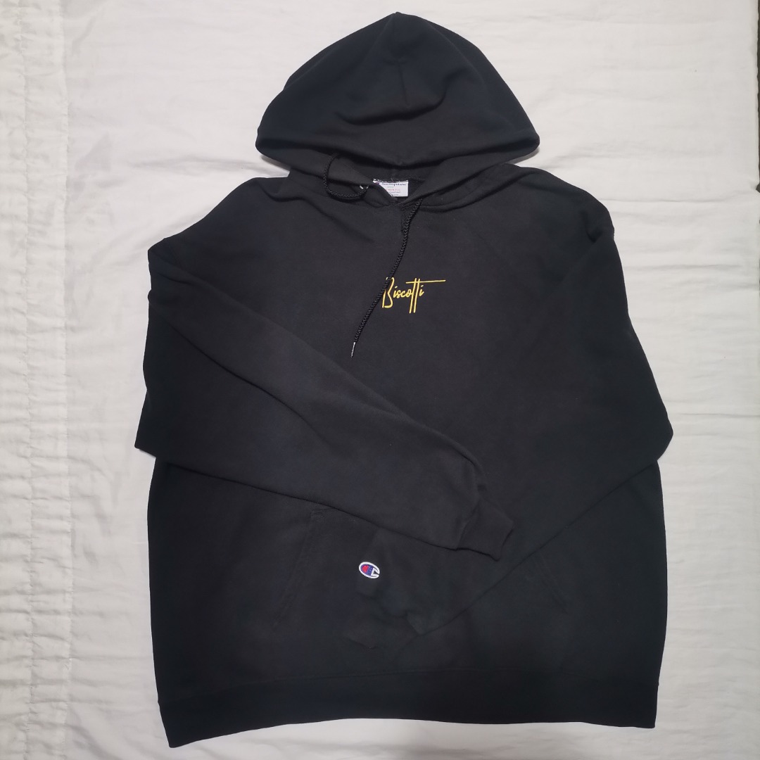 Black champion hoodie sales with gold writing