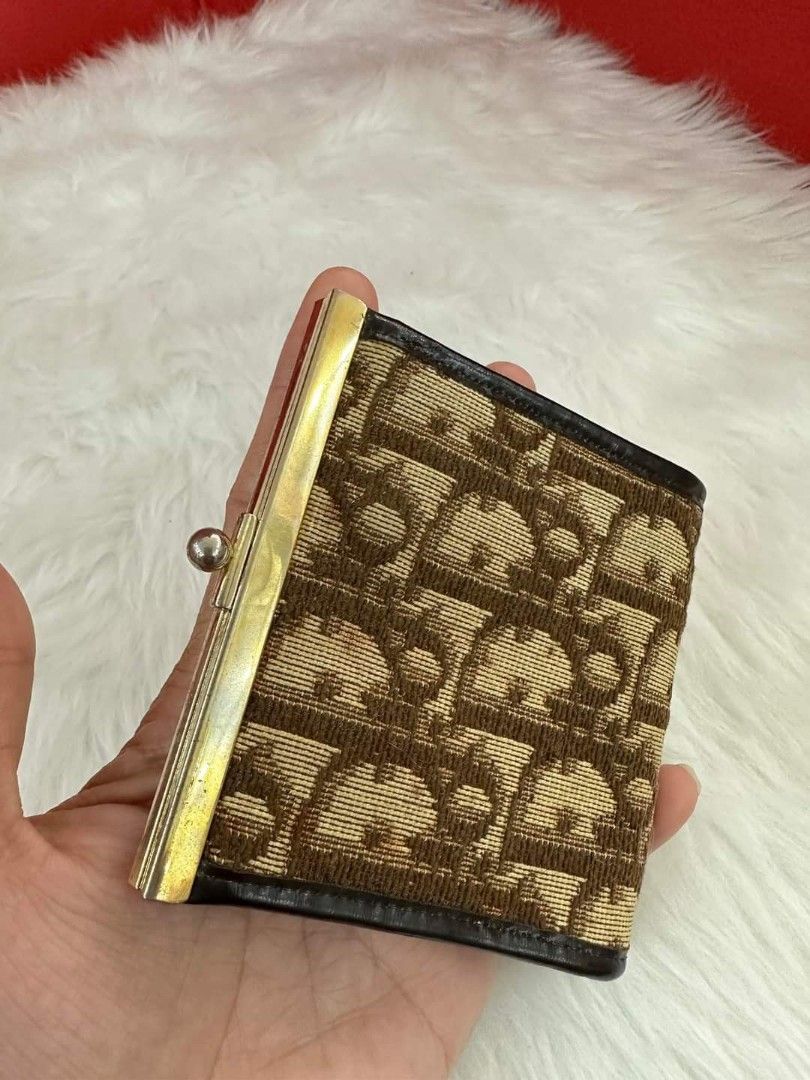 Dior VinTage (Category: Luxury Bags & Wallets) located in General Santos City (Dadiangas). Submitted by braverabbit.67 (Listing ID 1265932397, Image 3). Description: VinTage ORig!! 💯💯 Ka cute😻✨ Di o r kisslock CoinPurse Rank A -body may fade lang sa bakal niya pero maganda pa😍.