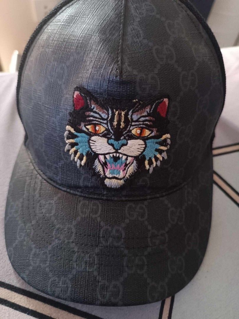 Gucci hat angry cat top