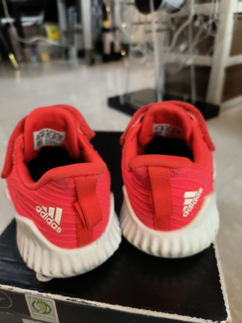 Childrens red adidas trainers top