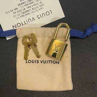 Shop Louis Vuitton Louis Vuitton LV DOG KEY HOLDER AND BAG CHARM by  Bellaris