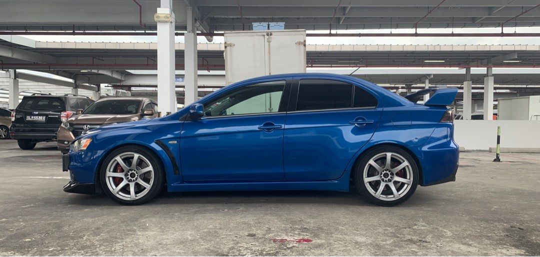 Mitsubishi Lancer Evolution X 2.0 GSR (M) (Category: Used Cars) located in Singapore. Submitted by adamone (Listing ID 1266004465, Image 3). Description: Fully Built Forged 4B11T engine port and polished, 5 Speed Manual Gearbox With New Synchros (1 to reverse), A Year Old. Changed Transfer Case (used) Tomei Poncams, Forged Pistons & Conrods, HKS Hi Power Catback, BCBR Coilovers, HKS Fuel Rail, HKS BOV, HKS Mushroom Air Intake, Various HKS Piping 