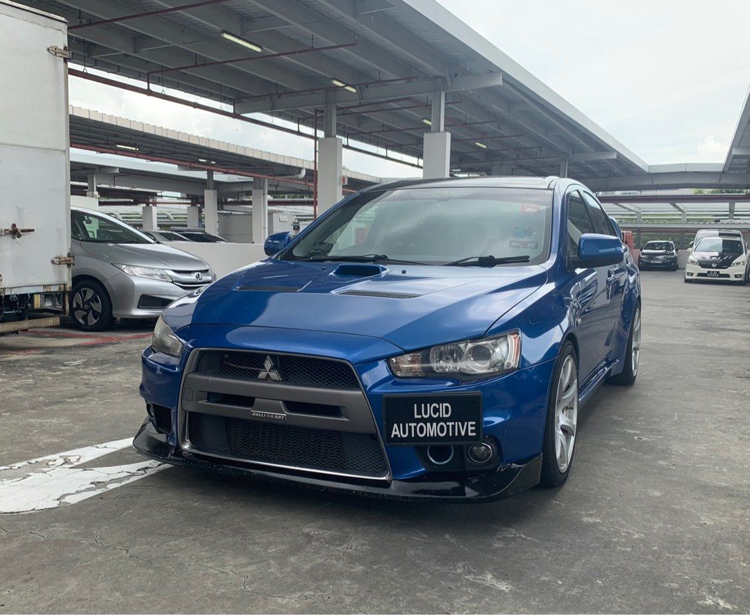 Mitsubishi Lancer Evolution X 2.0 GSR (M) (Category: Used Cars) located in Singapore. Submitted by adamone (Listing ID 1266004465, Image 2). Description: Fully Built Forged 4B11T engine port and polished, 5 Speed Manual Gearbox With New Synchros (1 to reverse), A Year Old. Changed Transfer Case (used) Tomei Poncams, Forged Pistons & Conrods, HKS Hi Power Catback, BCBR Coilovers, HKS Fuel Rail, HKS BOV, HKS Mushroom Air Intake, Various HKS Piping 