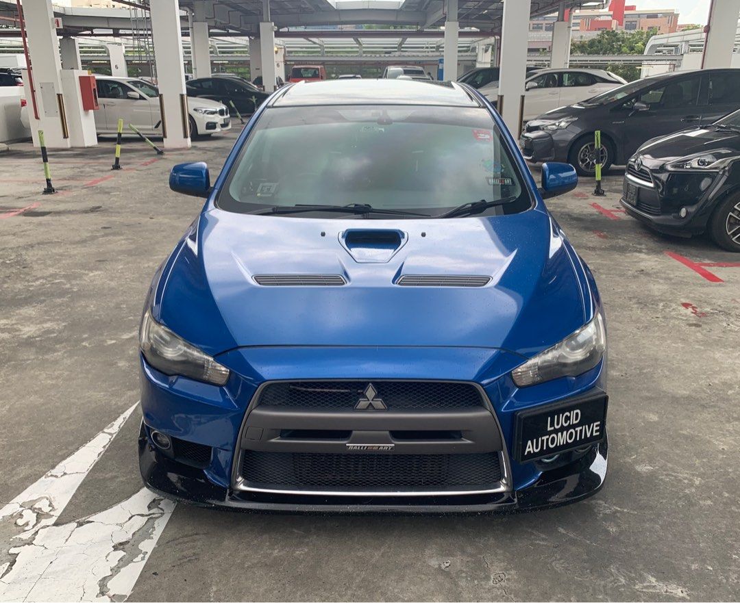 Mitsubishi Lancer Evolution X 2.0 GSR (M) (Category: Used Cars) located in Singapore. Submitted by adamone (Listing ID 1266004465, Image 1). Description: Fully Built Forged 4B11T engine port and polished, 5 Speed Manual Gearbox With New Synchros (1 to reverse), A Year Old. Changed Transfer Case (used) Tomei Poncams, Forged Pistons & Conrods, HKS Hi Power Catback, BCBR Coilovers, HKS Fuel Rail, HKS BOV, HKS Mushroom Air Intake, Various HKS Piping 
