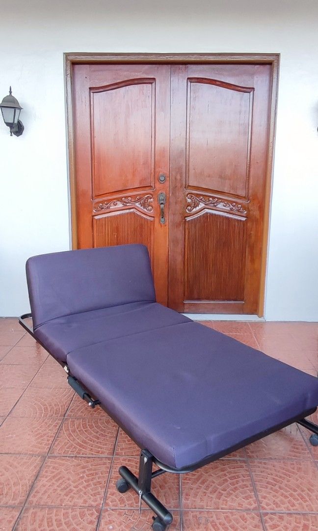 recliner folding bed with Foam portable bed. (Category: Bed Frames & Mattresses) located in Valenzuela. Submitted by jmalano (Listing ID 1265910715, Image 1). Description: for sale heavy duty folding bed with foam. can be reclined. used in good condition. pick up location Forrune Village Valenzuela City..