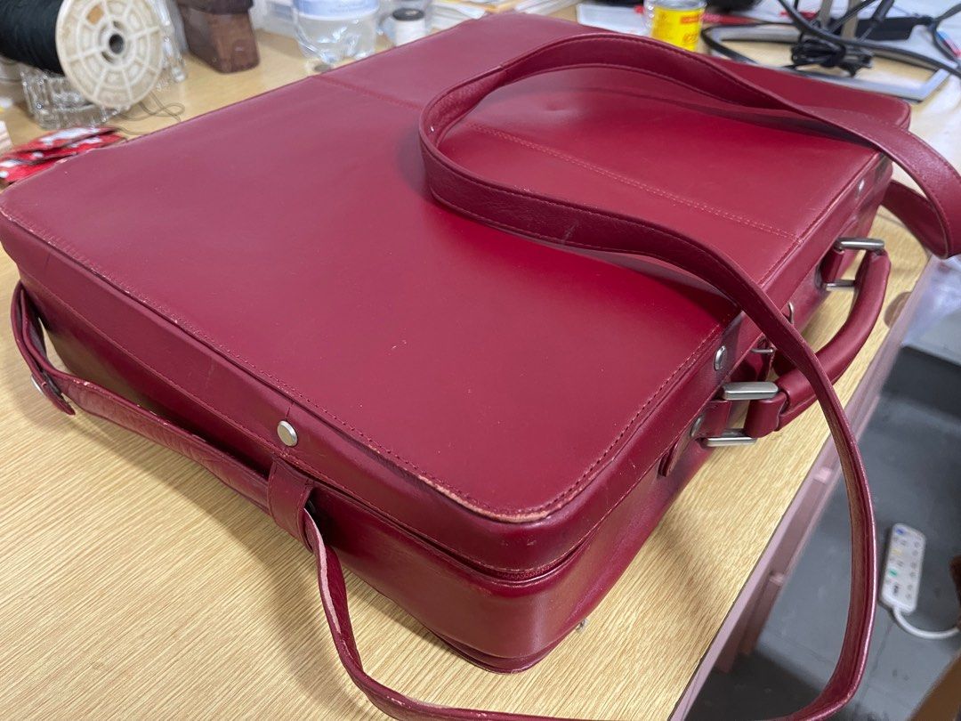 Used red leather laptop briefcase bag with strap